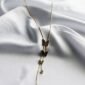 Gold-Toned Cascading Butterfly Charm Necklace - - gg000099